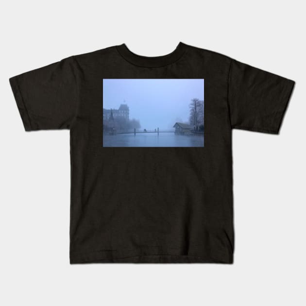 Crossing Aare river in Thun town Kids T-Shirt by Cretense72